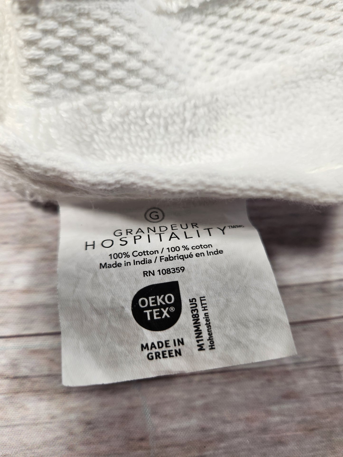 Embroidered bear and scenery embossed style hand towel