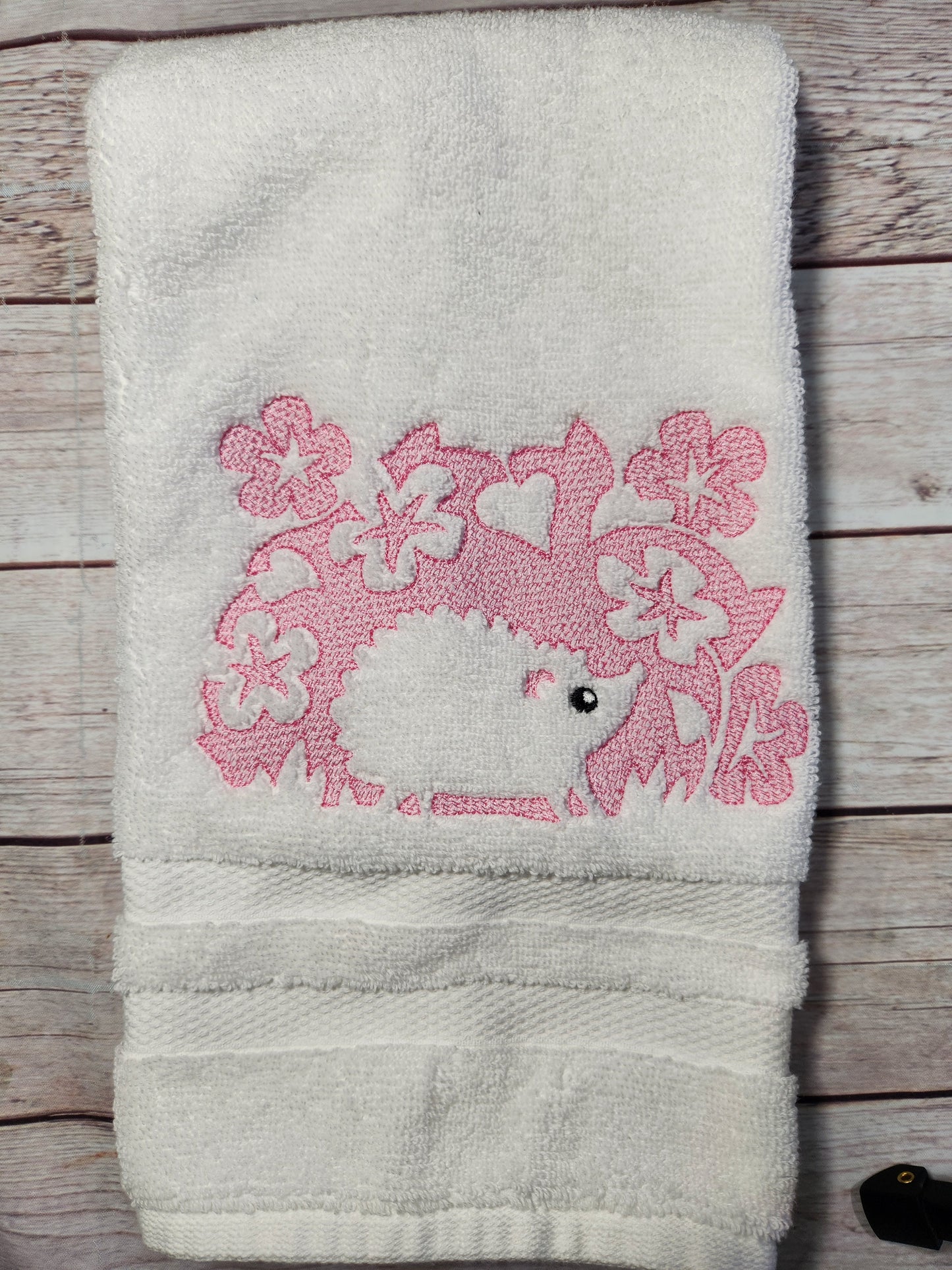 Embroidered hedgehog embossed style hand towel