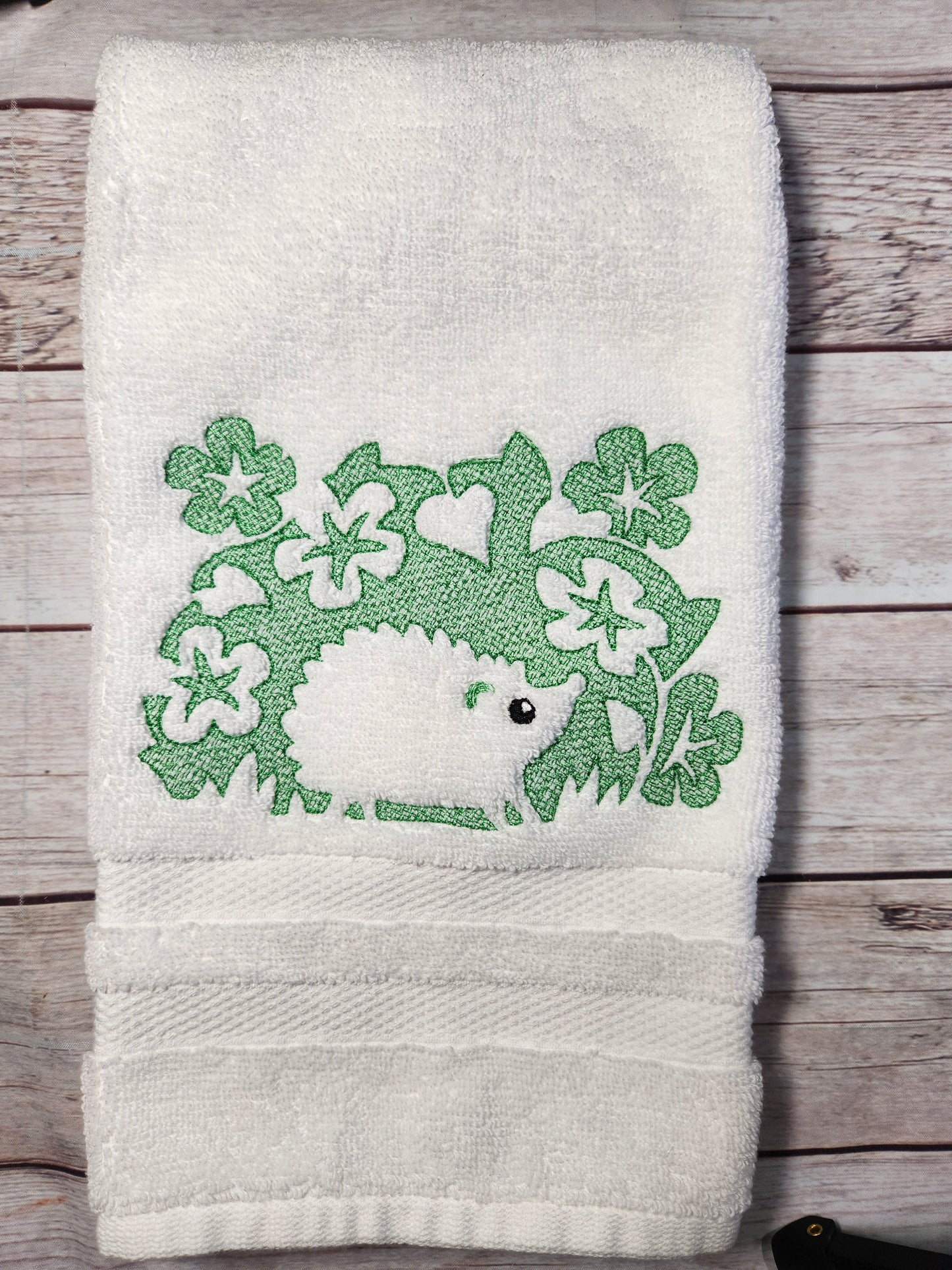 Embroidered hedgehog embossed style hand towel